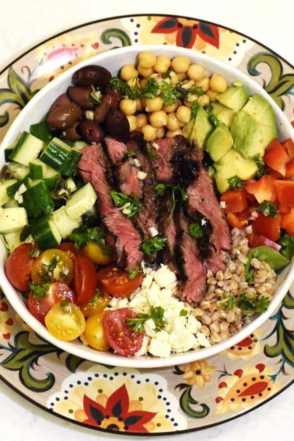 greek steak salad bowl viewed from above, on the gypsy plate