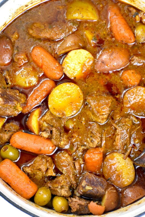 Puerto Rican Carne Guisada is a Latin flavor bomb of a stew. Melt in your mouth tender chunks of beef along with veggies and plenty of flavor enhancers.