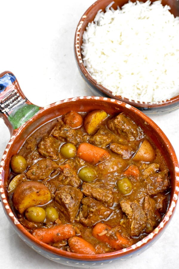 Puerto Rican Carne Guisada is a Latin flavor bomb of a stew. Melt in your mouth tender chunks of beef along with veggies and plenty of flavor enhancers.