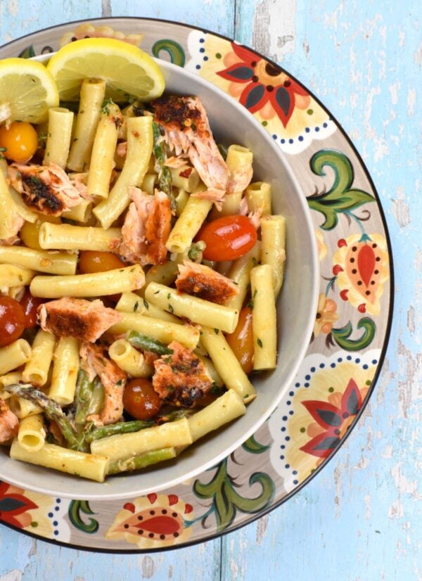 bowl of salmon pasta atop the Gypsy Plate